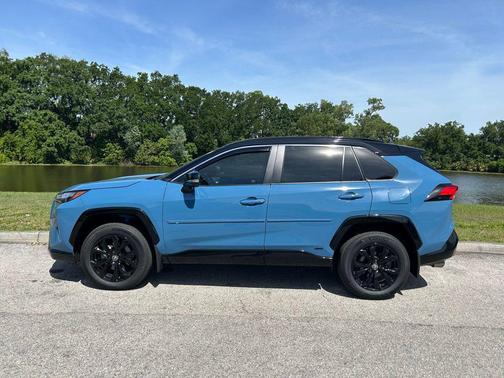 Cavalry Blue/Midnight Black Metallic 2025 Toyota RAV4 Hybrid SE