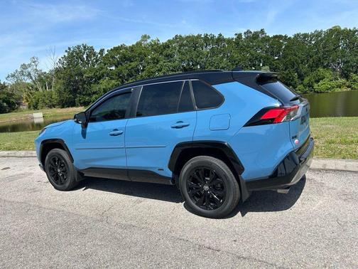 Cavalry Blue/Midnight Black Metallic 2025 Toyota RAV4 Hybrid SE