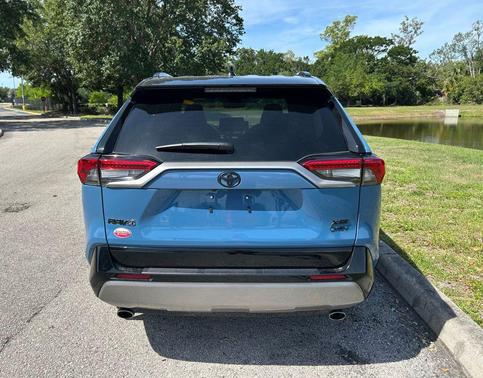 Cavalry Blue/Midnight Black Metallic 2025 Toyota RAV4 Hybrid SE