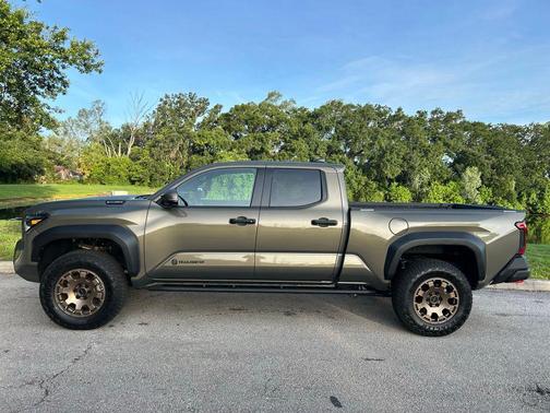Bronze Oxide 2025 Toyota Tacoma Hybrid Trailhunter