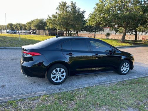 Midnight Black Metallic 2026 Toyota Corolla Hybrid LE