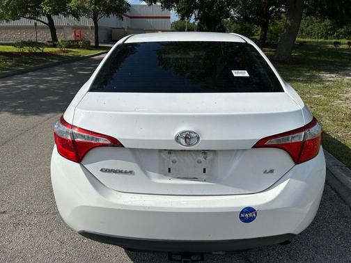Super White 2015 Toyota Corolla LE