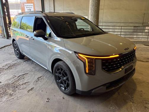 Ceramic White 2025 Kia Carnival Hybrid SX