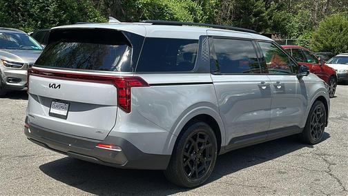 Ceramic White 2025 Kia Carnival Hybrid SX