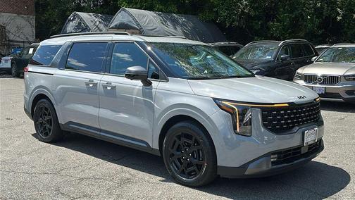 Ceramic White 2025 Kia Carnival Hybrid SX