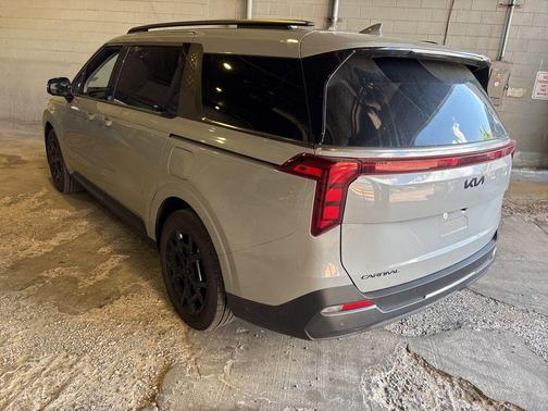 Ceramic White 2025 Kia Carnival Hybrid SX