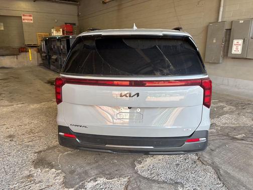 Ceramic White 2025 Kia Carnival Hybrid SX