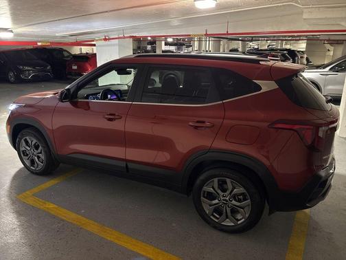 Orange 2024 Kia Seltos S