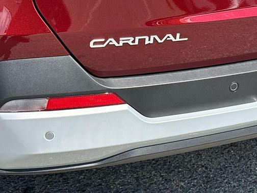 Red 2026 Kia Carnival Hybrid EX