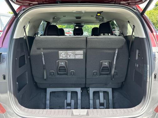Red 2026 Kia Carnival Hybrid EX