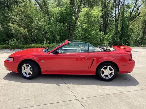 Red 2004 Ford Mustang Deluxe