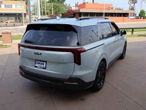 Ivory Silver 2025 Kia Carnival Hybrid SX Prestige