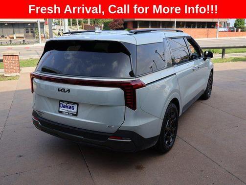 Ivory Silver 2025 Kia Carnival Hybrid SX Prestige