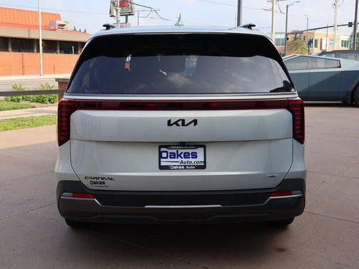 Ivory Silver 2025 Kia Carnival Hybrid SX Prestige
