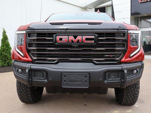 Volcanic Red Tintcoat 2026 GMC Sierra 1500 AT4X