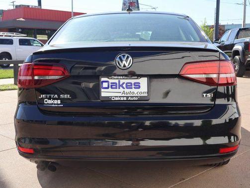 Black Uni 2016 Volkswagen Jetta 1.8T SEL