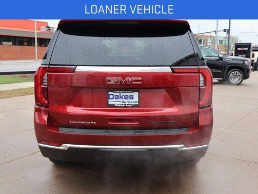 Volcanic Red Tintcoat 2026 GMC Yukon 4WD Elevation