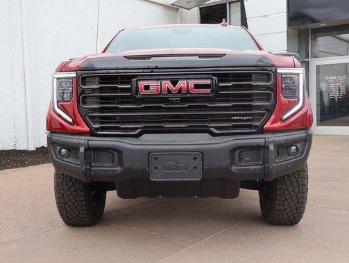 Volcanic Red Tintcoat 2026 GMC Sierra 1500 AT4X