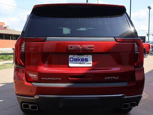Volcanic Red Tintcoat 2026 GMC Yukon 4WD AT4 Ultimate