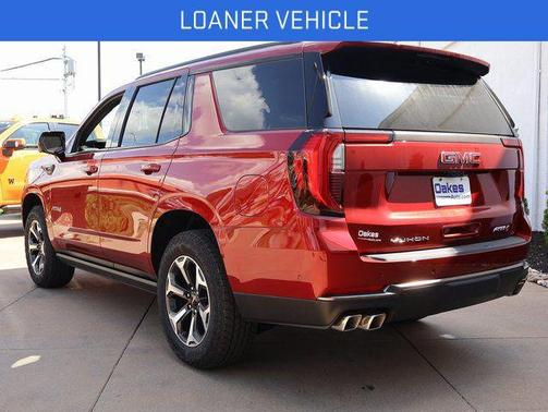 Volcanic Red Tintcoat 2026 GMC Yukon 4WD AT4 Ultimate