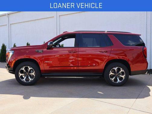 Volcanic Red Tintcoat 2026 GMC Yukon 4WD AT4 Ultimate