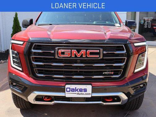Volcanic Red Tintcoat 2026 GMC Yukon 4WD AT4 Ultimate