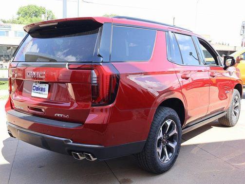 Volcanic Red Tintcoat 2026 GMC Yukon 4WD AT4 Ultimate