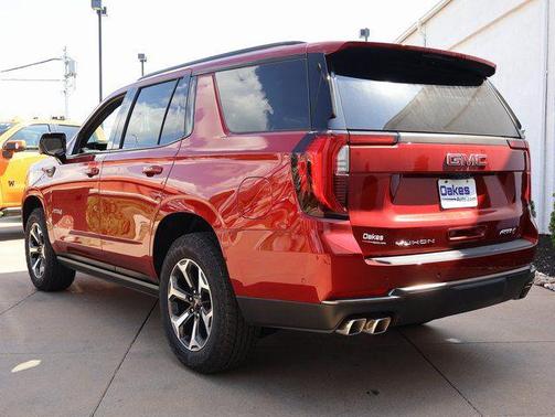 Volcanic Red Tintcoat 2026 GMC Yukon 4WD AT4 Ultimate