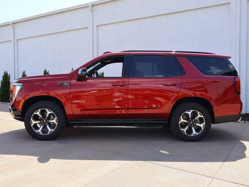 Volcanic Red Tintcoat 2026 GMC Yukon 4WD AT4 Ultimate