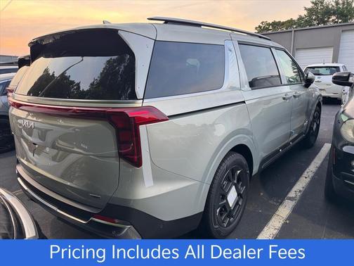 Ivory 2026 Kia Carnival Hybrid SX
