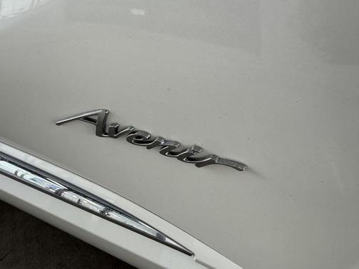 White Frost Tricoat 2023 Buick Envision Avenir AWD