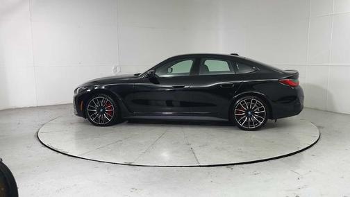 Black Sapphire Metallic 2024 BMW i4 Gran Coupe M50