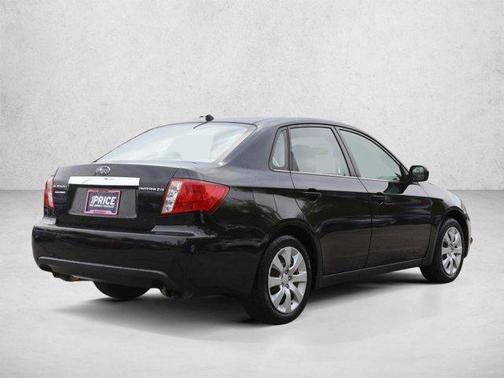 Obsidian Black Pearl 2010 Subaru Impreza 2.5 i
