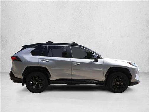 Silver Sky Metallic/Midnight Black Metallic 2023 Toyota RAV4 Hybrid SE