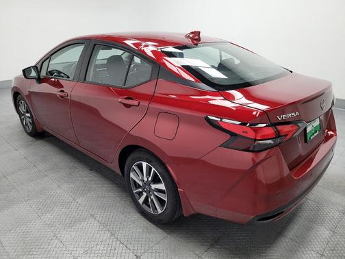 Scarlet Ember Tintcoat 2024 Nissan Versa 1.6 SV