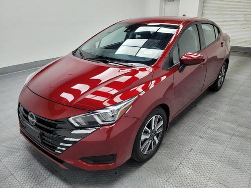 Scarlet Ember Tintcoat 2024 Nissan Versa 1.6 SV