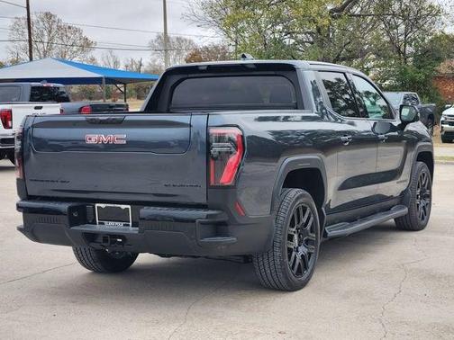 Deep Ocean Metallic 2026 GMC Sierra EV Extended Range Elevation