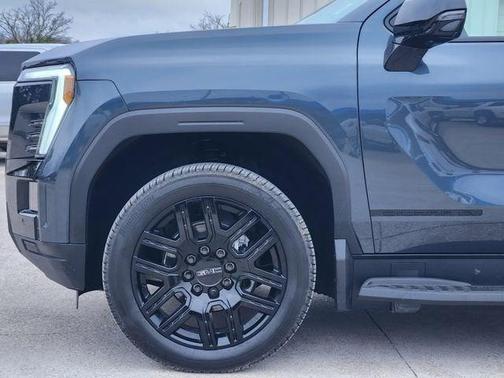 Deep Ocean Metallic 2026 GMC Sierra EV Extended Range Elevation