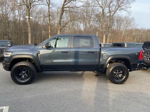 Forged Blue Metallic 2026 RAM 1500 RHO Crew Cab 4x4 5'7' Box