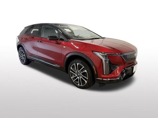 Radiant Red Tintcoat 2026 Cadillac OPTIQ Premium Sport