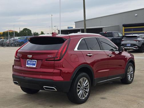 Radiant Red Tintcoat 2024 Cadillac XT4 Premium Luxury