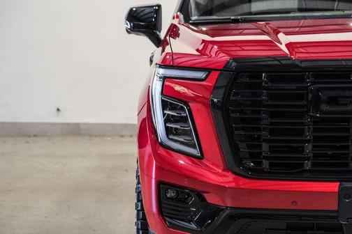 Volcanic Red Tintcoat 2026 GMC Yukon Denali