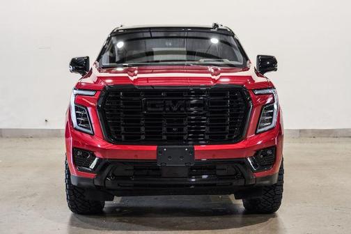 Volcanic Red Tintcoat 2026 GMC Yukon Denali