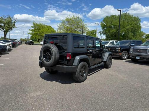 Black 2016 Jeep Wrangler Unlimited Sport