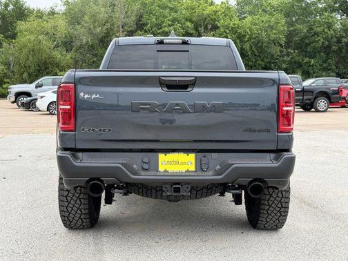 Forged Blue Metallic 2026 RAM 1500 RHO Crew Cab 4x4 5'7' Box