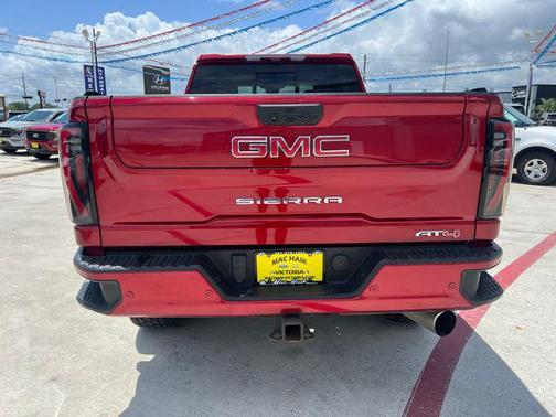 Volcanic Red Tintcoat 2024 GMC Sierra 2500 AT4