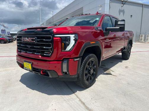 Volcanic Red Tintcoat 2024 GMC Sierra 2500 AT4
