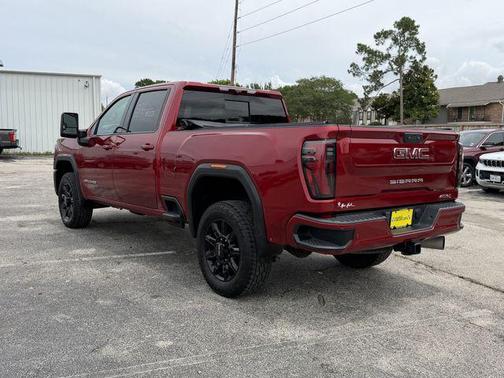 Volcanic Red Tintcoat 2024 GMC Sierra 2500 AT4