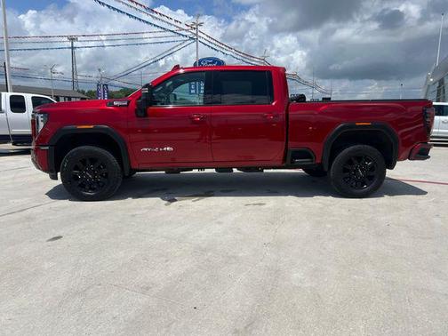 Volcanic Red Tintcoat 2024 GMC Sierra 2500 AT4