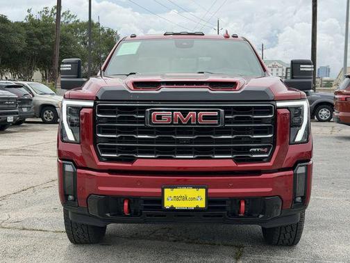 Volcanic Red Tintcoat 2024 GMC Sierra 2500 AT4